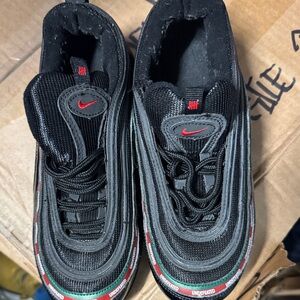 Nike Kids Black Sneakers with Red Accents